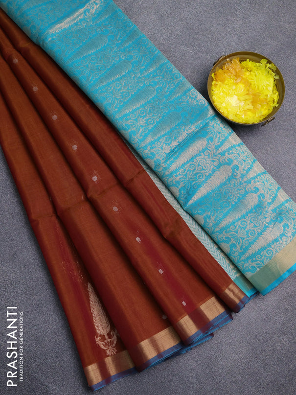 Kora silk cotton saree honey shade and teal blue with allover silver zari woven buttas and zari woven border