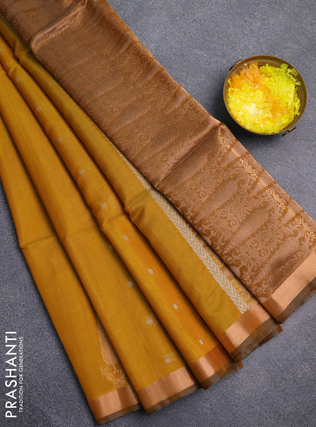 Kora silk cotton saree mustard yellow and dark mustard with allover silver zari woven buttas and zari woven border