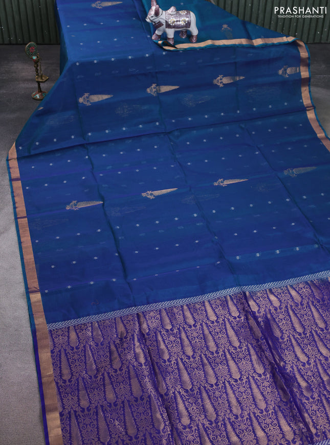 Kora silk cotton saree dual shade of bluish green and blue with allover silver zari woven buttas and zari woven border