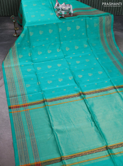 Kora silk cotton saree teal green shade with allover zari woven buttas and zari woven border
