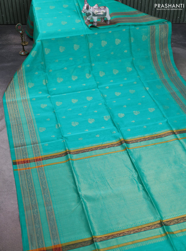 Kora silk cotton saree teal green shade with allover zari woven buttas and zari woven border