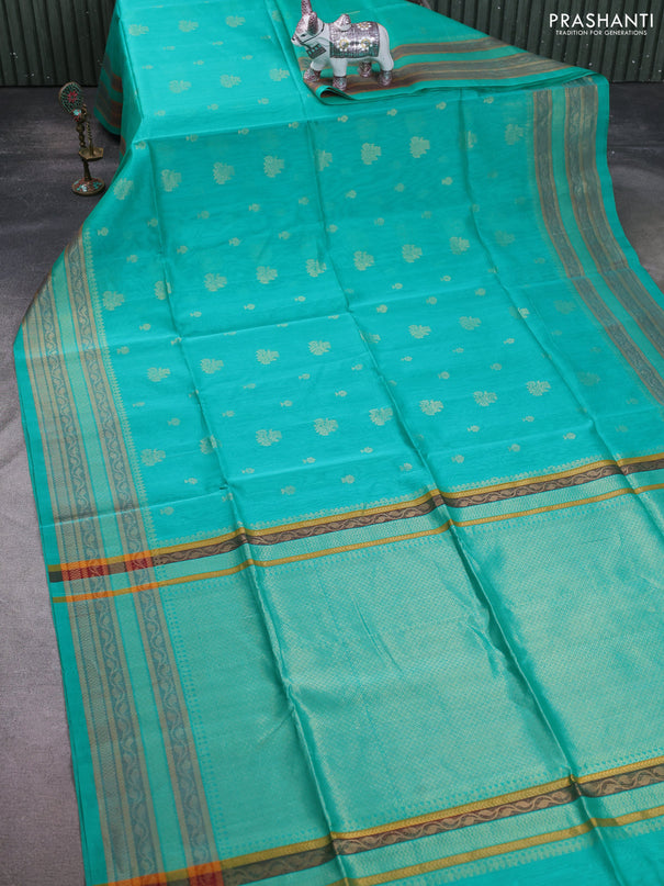 Kora silk cotton saree teal green shade with allover zari woven buttas and zari woven border