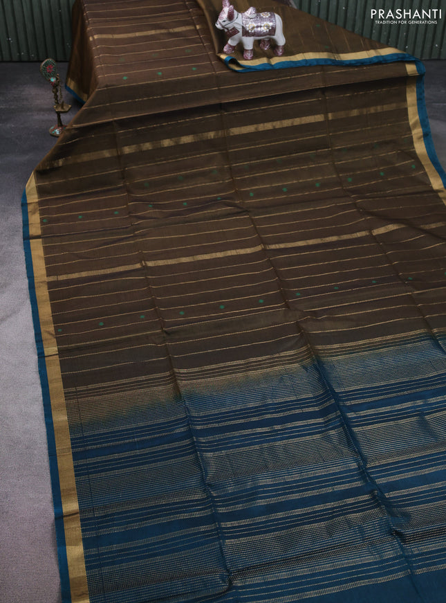 Kora silk cotton saree military green and peacock green with allover zari weaves & thread woven buttas and zari woven border