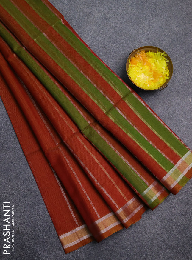 Kora silk cotton saree rust shade and light green with allover silver & gold zari weaves and zari woven border