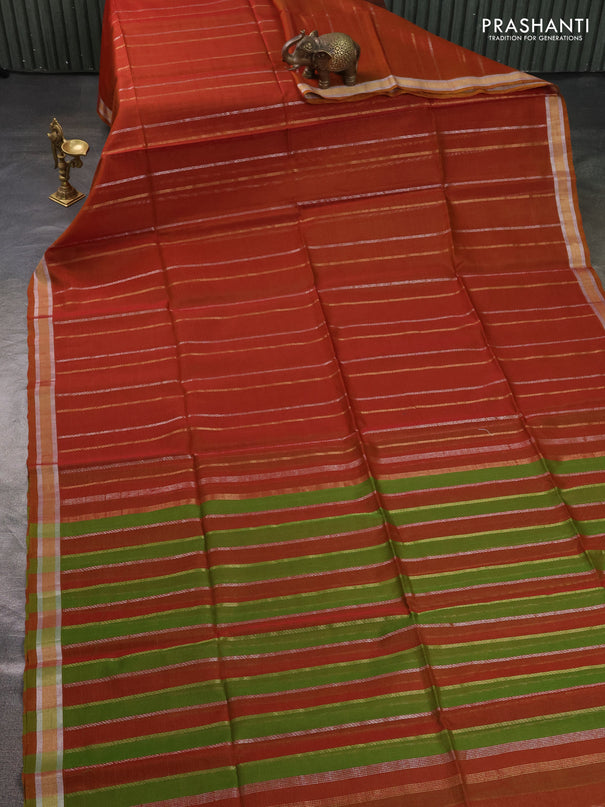 Kora silk cotton saree rust shade and light green with allover silver & gold zari weaves and zari woven border