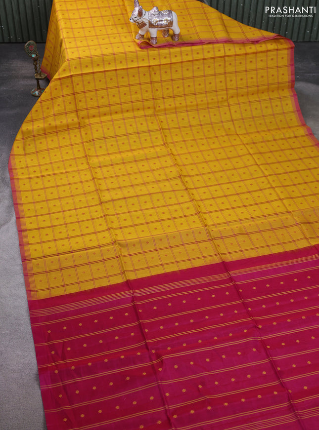 Kora silk cotton saree yellow and pink with allover checks & thread buttas and simple border