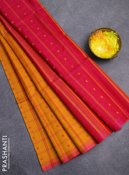 Kora silk cotton saree mango yellow and pink with allover checks & thread buttas and simple border