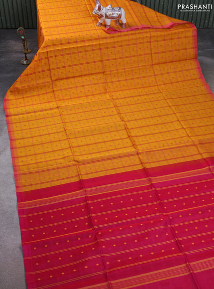 Kora silk cotton saree mango yellow and pink with allover checks & thread buttas and simple border