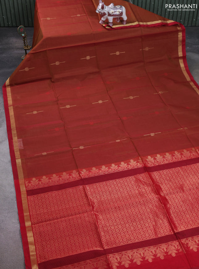 Kora silk cotton saree dual shade of dark mustard and red with thread & zari woven buttas and zari woven simple border