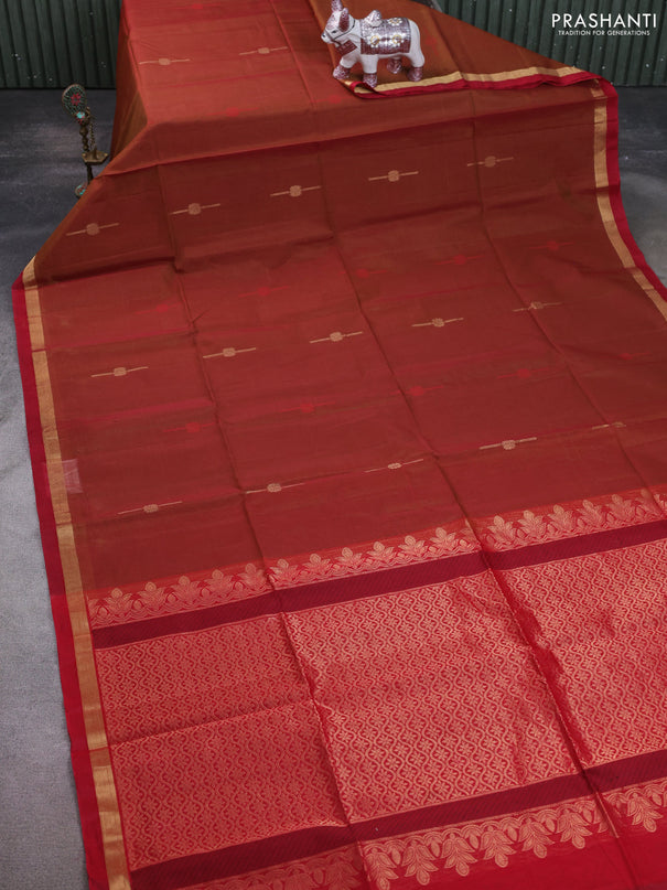 Kora silk cotton saree dual shade of dark mustard and red with thread & zari woven buttas and zari woven simple border