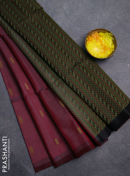 Kora silk cotton saree dual shade of pastel maroon and black with thread woven buttas and simple border