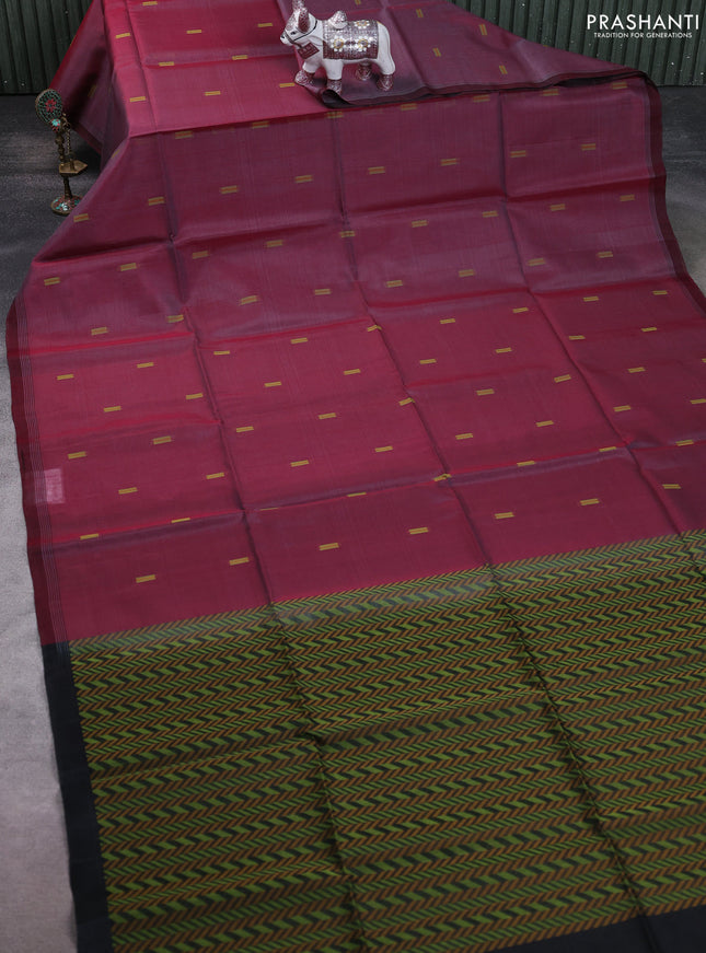 Kora silk cotton saree dual shade of pastel maroon and black with thread woven buttas and simple border
