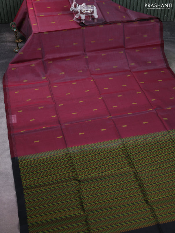 Kora silk cotton saree dual shade of pastel maroon and black with thread woven buttas and simple border