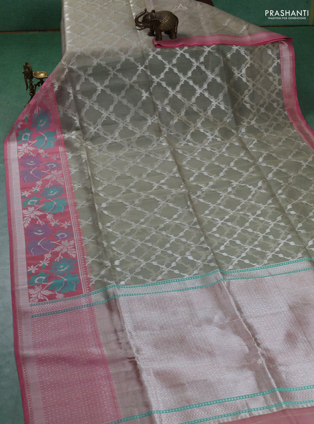 Kora jamdhani silk saree beige and mild peach pink with allover silver woven jamdhani weaves and long floral zari woven border