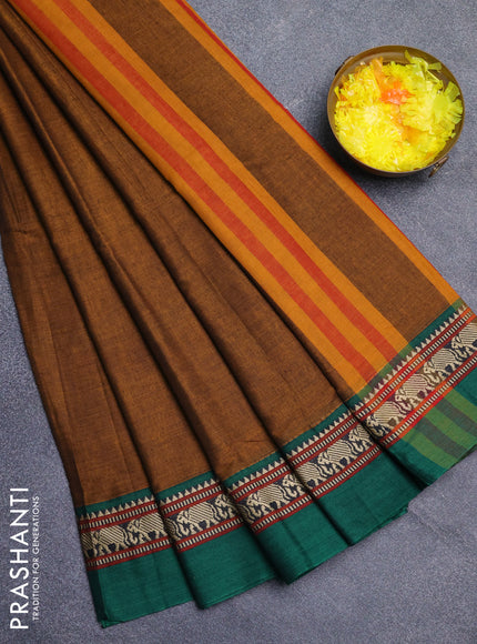 Narayanpet cotton saree dark mustard and green with plain body and thread woven simple border