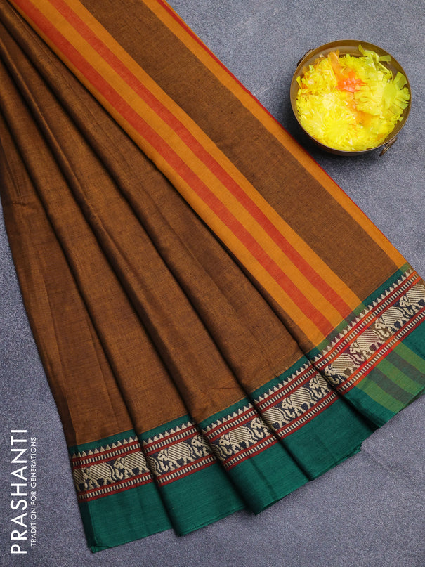 Narayanpet cotton saree dark mustard and green with plain body and thread woven simple border