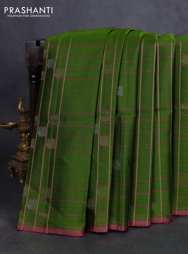 Pure soft silk saree green and mild peach pink with allover checked pattern & zari buttas and piping border
