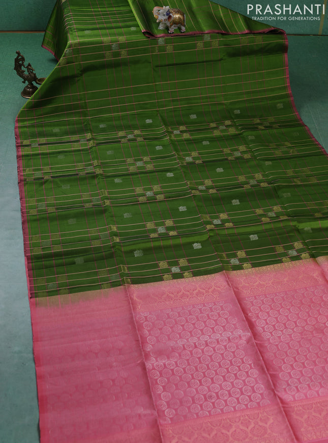Pure soft silk saree green and mild peach pink with allover checked pattern & zari buttas and piping border