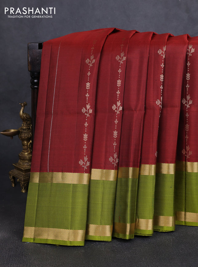 Pure soft silk saree maroon and mehendi green with allover silver & gold zari weaves and rettapet zari woven border