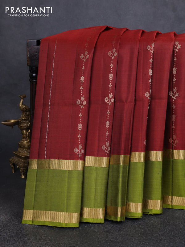 Pure soft silk saree maroon and mehendi green with allover silver & gold zari weaves and rettapet zari woven border