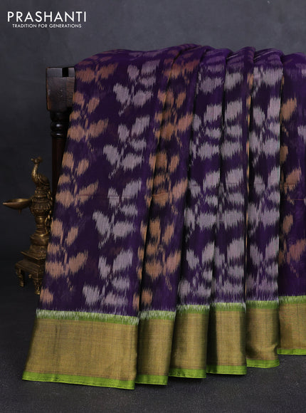 Ikat silk cotton saree deep violet and light green with allover ikat weaves and zari woven border