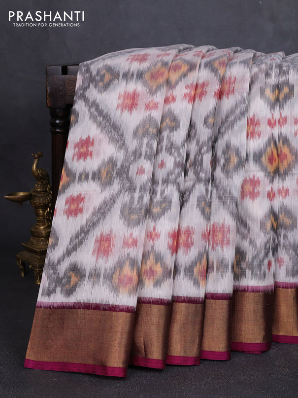 Ikat silk cotton saree off white and wine shade with allover ikat weaves and zari woven border