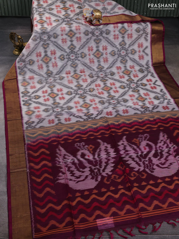 Ikat silk cotton saree off white and wine shade with allover ikat weaves and zari woven border