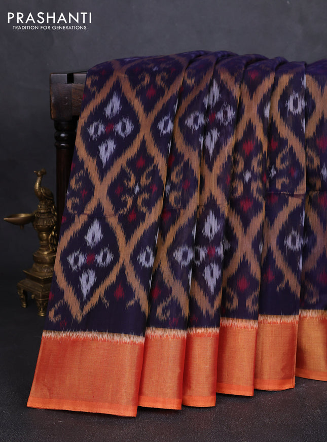 Ikat silk cotton saree navy blue and orange shade with allover ikat weaves and zari woven border