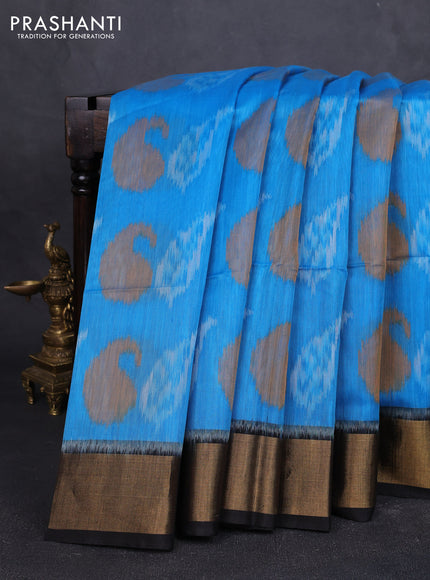 Ikat silk cotton saree light blue and black with allover ikat weaves and zari woven border