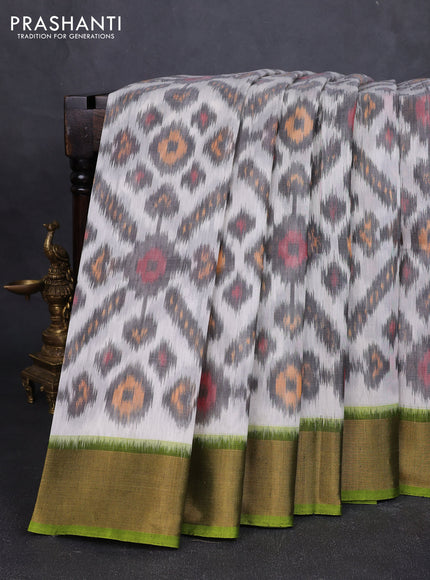 Ikat silk cotton saree off white and light green with allover ikat weaves and zari woven border