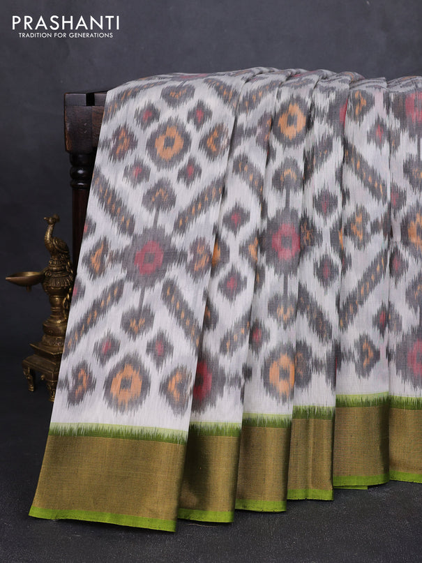 Ikat silk cotton saree off white and light green with allover ikat weaves and zari woven border