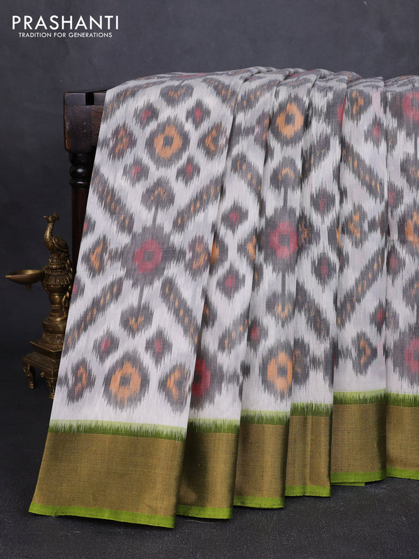 Ikat silk cotton saree off white and light green with allover ikat weaves and zari woven border