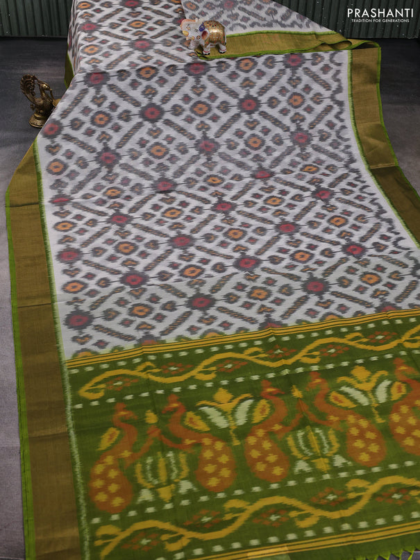 Ikat silk cotton saree off white and light green with allover ikat weaves and zari woven border