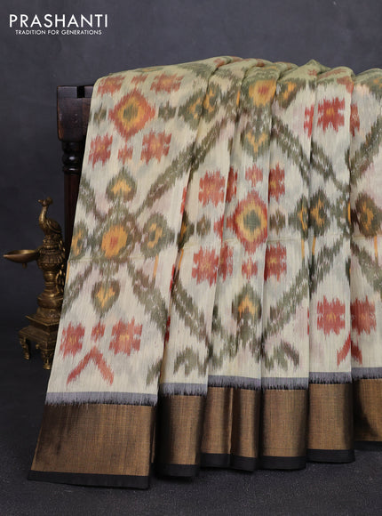 Ikat silk cotton saree cream and black with allover ikat weaves and zari woven border