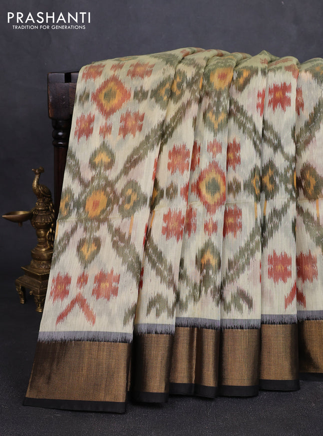Ikat silk cotton saree cream and black with allover ikat weaves and zari woven border