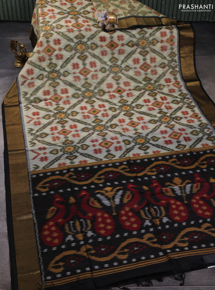 Ikat silk cotton saree cream and black with allover ikat weaves and zari woven border