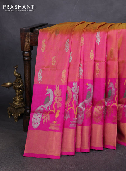 Pure uppada silk saree dual shade of pinkish orange and pink with allover silver & zari woven buttas and long zari woven buttas