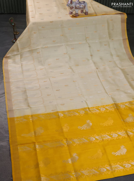 Pure uppada silk saree cream with allover paisley zari woven buttas and zari woven border