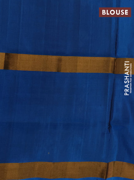 Pure uppada silk saree black and cs blue with allover zari woven buttas and long rettapet zari woven butta border