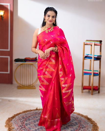 Pure uppada silk saree dual shade of pinkish orange with allover silver & zari woven buttas and long zari zigzag border