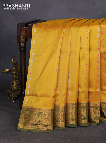Pure uppada silk saree mustard yellow and bottle green with allover zari woven buttas and zari woven border
