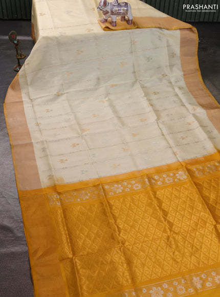 Pure uppada silk saree cream and mustard yellow with allover zari stripe & buttas and zari woven border