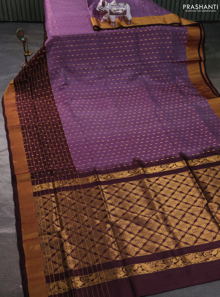 Pure uppada silk saree pastel purple and coffee brown with allover zari woven buttas and long zari woven butta border