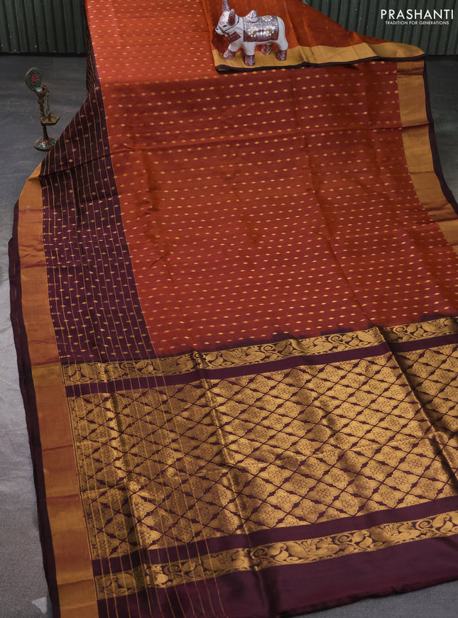 Pure uppada silk saree rust shade and coffee brown with allover zari woven buttas and long zari woven butta border