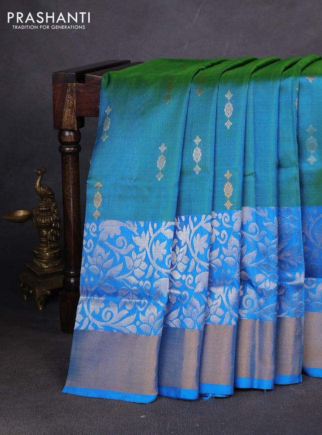 Pure uppada silk saree dual shade of teal bluish green and cs blue with allover silver & zari woven buttas and long zari woven border