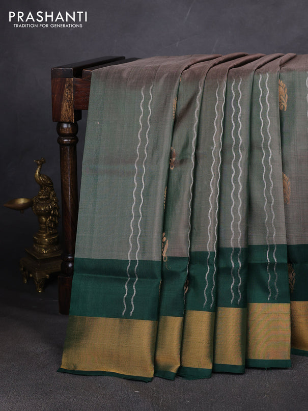 Pure uppada silk saree dual shade of green and bottle green with allover zari stripe & buttas and zari woven border