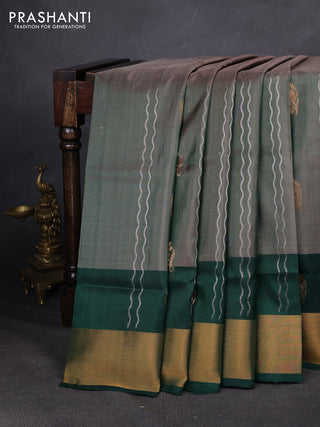 Pure uppada silk saree dual shade of green and bottle green with allover zari stripe & buttas and zari woven border