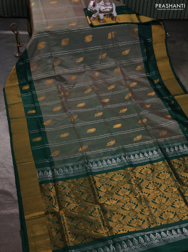 Pure uppada silk saree dual shade of green and bottle green with allover zari stripe & buttas and zari woven border