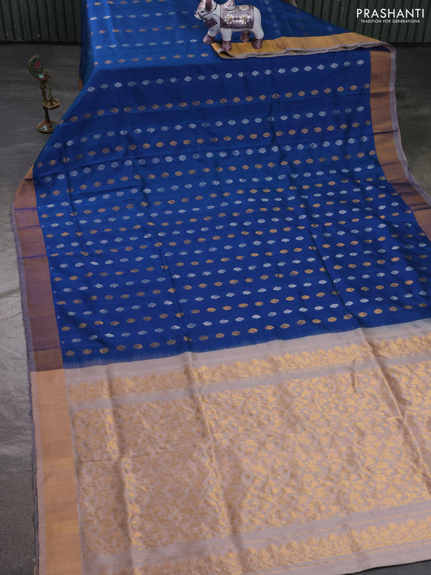Pure uppada silk saree peacock blue and beige with allover silver & zari woven buttas and zari woven simple border