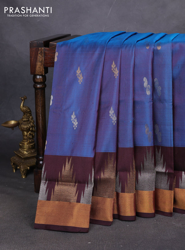 Pure uppada silk saree dual shade blue and coffee brown with allover silver & zari woven buttas and long temple zari woven border